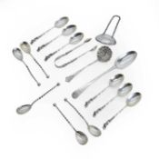 A collection of silver spoons,