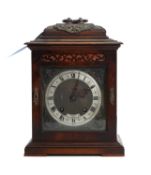 A wooden cased bracket clock,