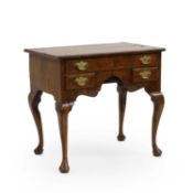 A walnut lowboy,