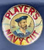 Advertising: Players Navy Cut Circular pictoral pressed tin sign
