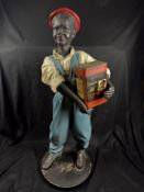 Advertising:  Decorative Figure of a Dark-Skinned Boy