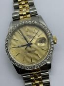 ROLEX GOLD & STEEL DATEJUST WATCH WITH A DIAMOND BEZEL