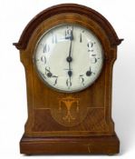 An early 20th century mahogany and sycamore marquetry cased eight day mantel clock by the William L.
