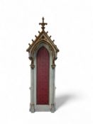 A late 19th century Gothic style painted and gilded pine canopy