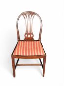 A set of ten 19th century mahogany dining chairs in the Hepplewhite style including a pair of open a