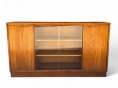 A mid 20th century Cumbrae teak bookcase by Morris of Glasgow