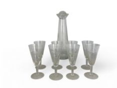A mid 20th century etched clear glass decanter set with eight wine glasses