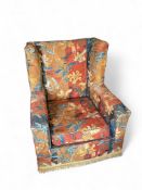 A mid 20th century floral upholstered lounge chair