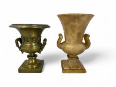 A 19th century gilt brass twin-handled urn vase and a similar marble example