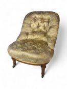 A Victorian satinwood fireside tub chair by Holland & Sons