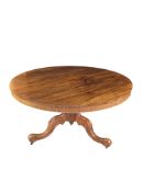 An early Victorian rosewood carved centre table