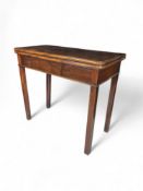 A late George III mahogany tea table