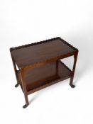 An Edwardian mahogany drinks / tea trolley