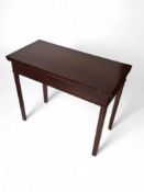 A late George III mahogany tea table
