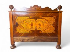 A 19th century Austrian walnut and penwork headboard and footboard