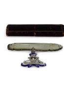 A Royal Artillery Regimental badge brooch and mother of pearl pen knife