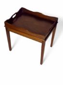 A 19th century style mahogany tray on stand