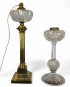 A late Victorian Hicks & Sons cut glass oil lamp together with a Corinthian column table lamp with a