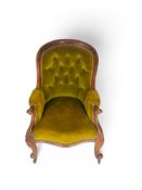 A mid Victorian walnut fireside chair