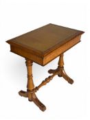 A Victorian Hungarian ash writing table in the manner of Holland & Sons