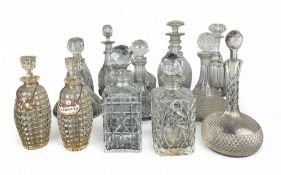 A group of cut glass decanters
