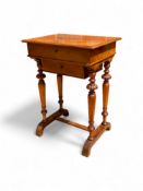 A late 19th century French walnut work table