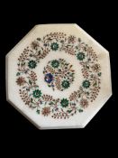 A small octagonal pietre dure table top