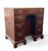 A George III mahogany kneehole desk