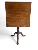 A George III mahogany square tripod table
