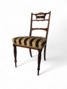 A set of four late Victorian Aesthetic period rosewood and marquetry chairs by James Shoolbred and C