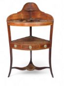 A late George III mahogany and boxwood strung corner washstand