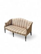 A George III ebonised and painted sofa