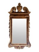 A late 19th / early 20th century George II style walnut and parcel gilt mirror