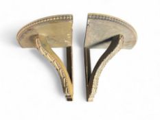 A pair of 19th century carved and gilded corner brackets