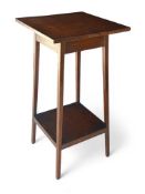 A late 19th / early 20th century Arts & Crafts oak two-tier occasional table, possibly Waring & Gill