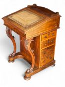 A Victorian walnut Davenport desk