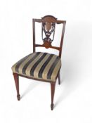 A set of five late Victorian rosewood and marquetry side chairs