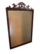 A large 19th century mahogany and parcel gilt fret carved mirror in the George II style