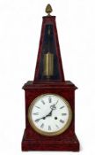 A red faux tortoiseshell clock, the movement by Vincetti, the case by R Street
