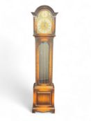 A 1930's oak quarter chiming long case clock of small proportions, Winterhalder, Germany