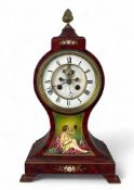A red faux tortoiseshell and decorated balloon mantel clock, the movement numbered 1901, the case by