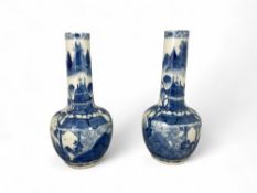 A pair of late 18th / early 19th century Chinese Kangxi style blue and white bottle vases
