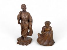Two early 20th century Chinese hardwood carved figures of fishermen