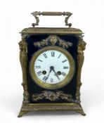A late 19th century French ebonised and brass mounted mantel clock by Japy Frères