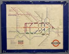 A 1936 Harry Beck station poster map (25 1/2x 33 1/4). Enlarged central area with diamond station