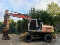 HITACHI EX165W WHEELED EXCAVATOR WITH RAILWAY GEAR - RUNS AND DRIVES