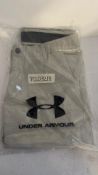Two Under Armour Men's Performance Tapered Trousers, Khaki Base, Size 34R