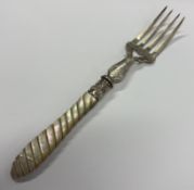A Victorian silver and MOP serving fork.