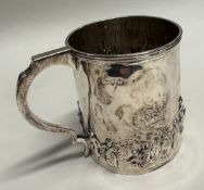 CHESTER: A silver mug.