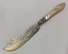 A Victorian silver and MOP serving knife.